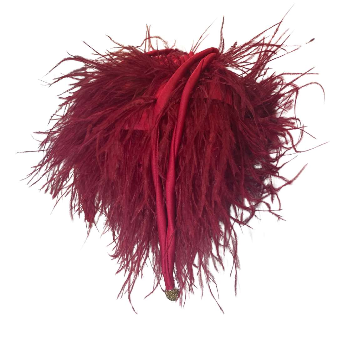 Borsetta da donna con piume rosse