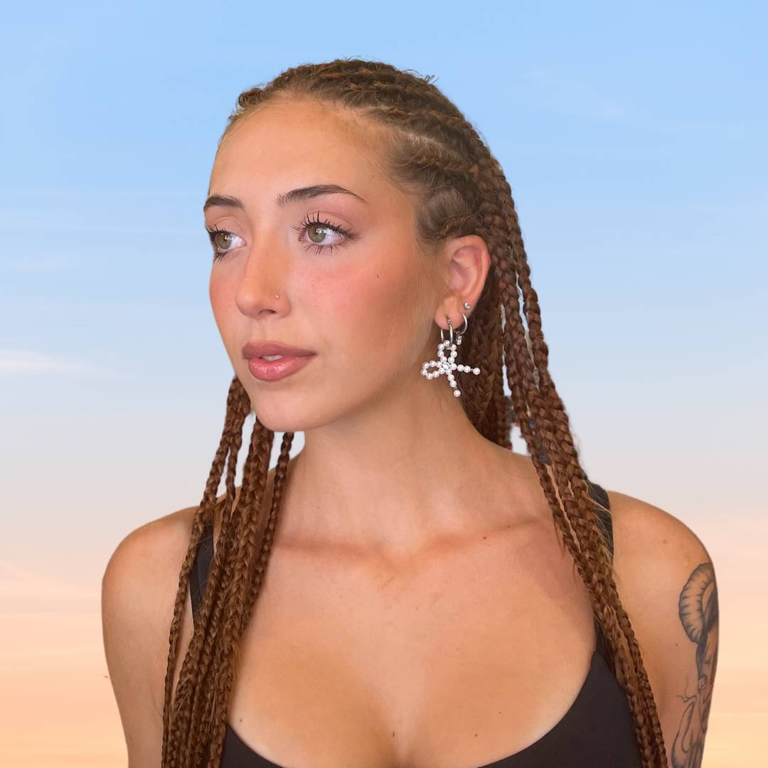 Orecchini fiocco con perle